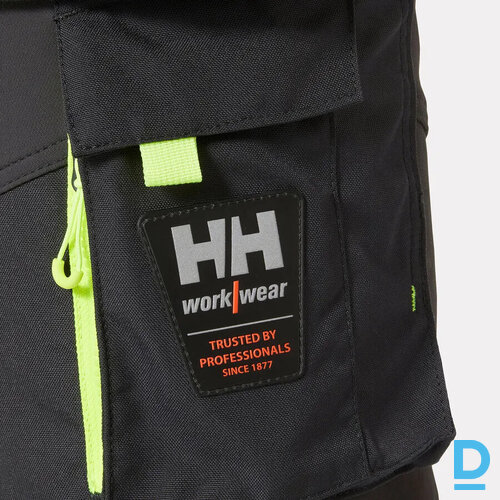 HELLY HANSEN 77471 CONSTRUCTION Darba Bikses ar Nokarenam Kabatām HI VIS 4 Way Stretch Cordura Washable Yellow Black NORWAY Drošības Darba Apģērbi Specapģērbi