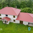 A two-storey new-build house with 10.8 hectares of land is for sale in a scenic,