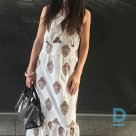 For sale - White long dress with a pattern
