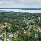 Green and relief land plot for private constructionThis spacious, tree-lined and