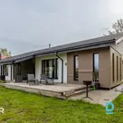 An elegant and modern single-storey detached house with a spacious, well-maintai