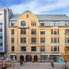 Office with balcony and loggia in the courtyard of a renovated building