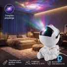 Seated astronaut star projector with remote