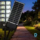 Black solar LED outdoor light with remote and motion sensor