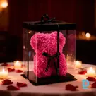 Pink artificial-rose bear in gift box, 25 cm