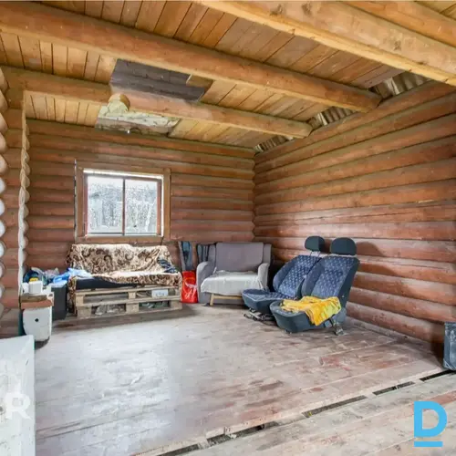 Pārdošanā plašs 3710 m² zemes gabals ar kompaktu koka guļbūvi Ogrē.Zeme atrodas 