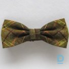 A cotton bow tie with a checkered pattern is for sale
