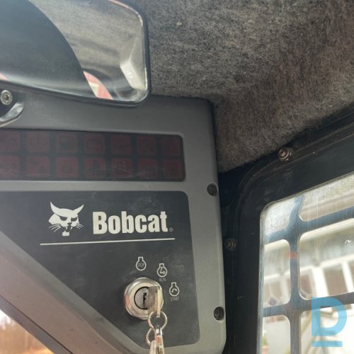 Bobcat S 250 ar rakšanas kauss 