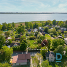 For sale a beautifully landscaped and level plot of land for the construction of a private house close to Ķīšezers lake