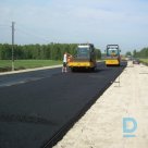 Offers asphalting Road construction