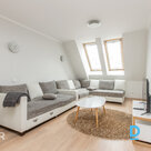 A spacious, furnished 3-room apartment on two levels with a rooftop terrace. A s