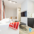 Elegant two-level apartment in a renovated building. The apartment is located on