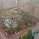 A flat, well-maintained plot of land for private house construction in a quiet n