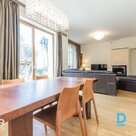 For sale is an elegant 3-storey house in a gated community with a view of Mežapa