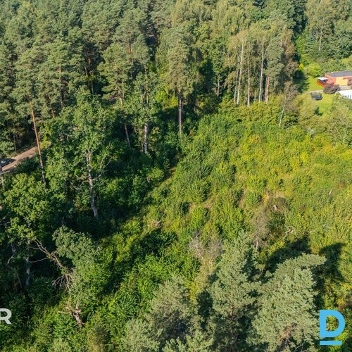 Pārdošanā daļēji atmežots 1,28 ha zemes gabals privātmāju būvniecībai pie Ādažie