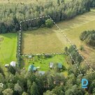 Продается ровный участок земли площадью 1 га под частную застройку в волости Дау