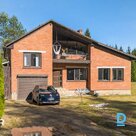 A two-storey private house with a spacious 2.12 ha land plot is for sale in a sc