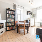 Apartment with a Fireplace, Wooden Floors and High Ceilings in GrīziņkalnsA brig